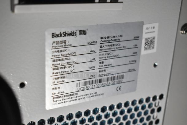 BlackShields DC0300 white metal cabinet label showing model, power supply -48V, rated current 2.4A, IP55, cooling capacity 300W.