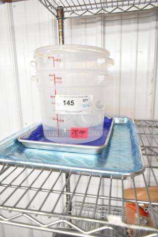 Brand new BlackShields 407BUNQRTR quarter size and 407BUNHALF half size aluminum bun pans and poly containers. Auction tag visible.