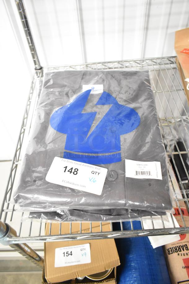 Slate gray chef shirt by Uncommon Chef, new condition, sealed in packaging. Size small, scratch and dent. Quantity: 6.