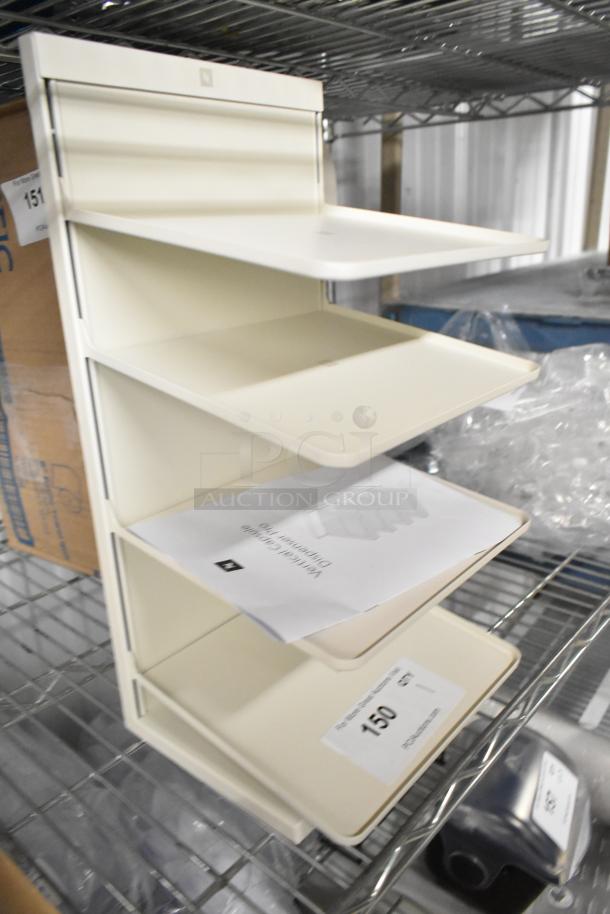 White 4-tier countertop filing system, excellent condition. Features open-front trays. Includes setup instructions.