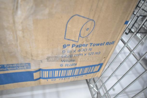Box of Pacific Blue 26610 paper towel rolls, 9-inch by 400 feet, white, containing 6 rolls. Barcode visible.