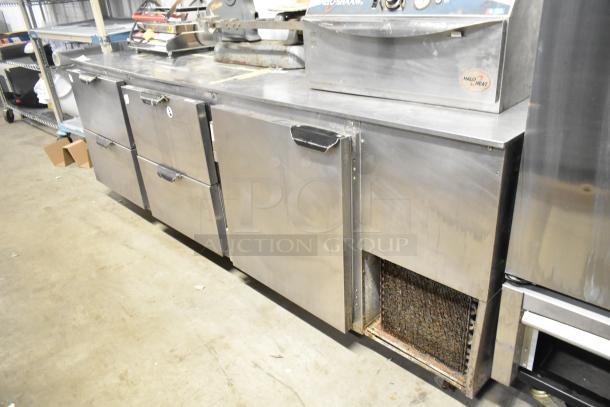Beverage Air UCRD93A-4-23 stainless steel undercounter cooler with 4 drawers, 1 door; 115 volts, 1 phase. Slight wear visible.
