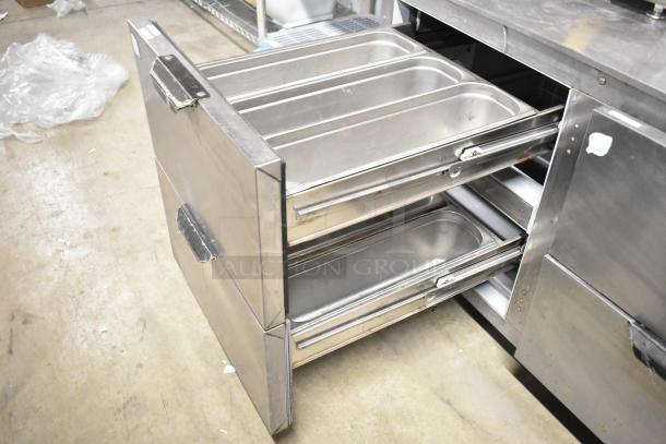 Beverage Air UCRD93A-4-23 stainless steel undercounter cooler with 4 drawers, 1 door. Measures 115 volts, 1 phase.