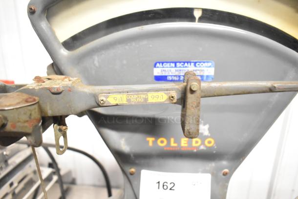 Toledo 3420 countertop metal bakery scale, vintage condition, visible labels with counting ratio markings.