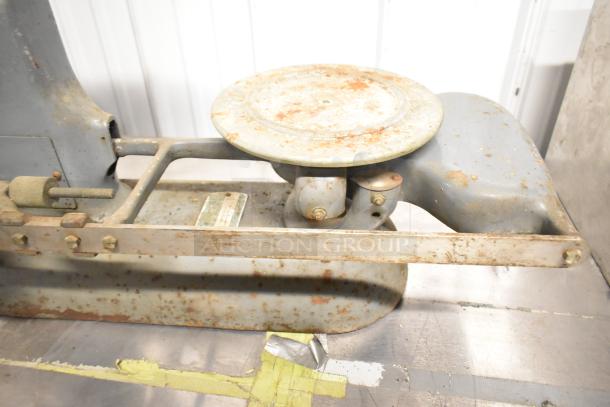 Toledo 3420 Countertop Metal Bakery Scale with visible rust and wear, featuring a round weighing platform and metal frame.