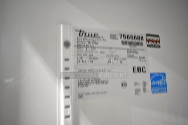 True T-72F stainless steel 3-door reach-in freezer, features poly-coated racks, on commercial casters, 115V, 1 phase.