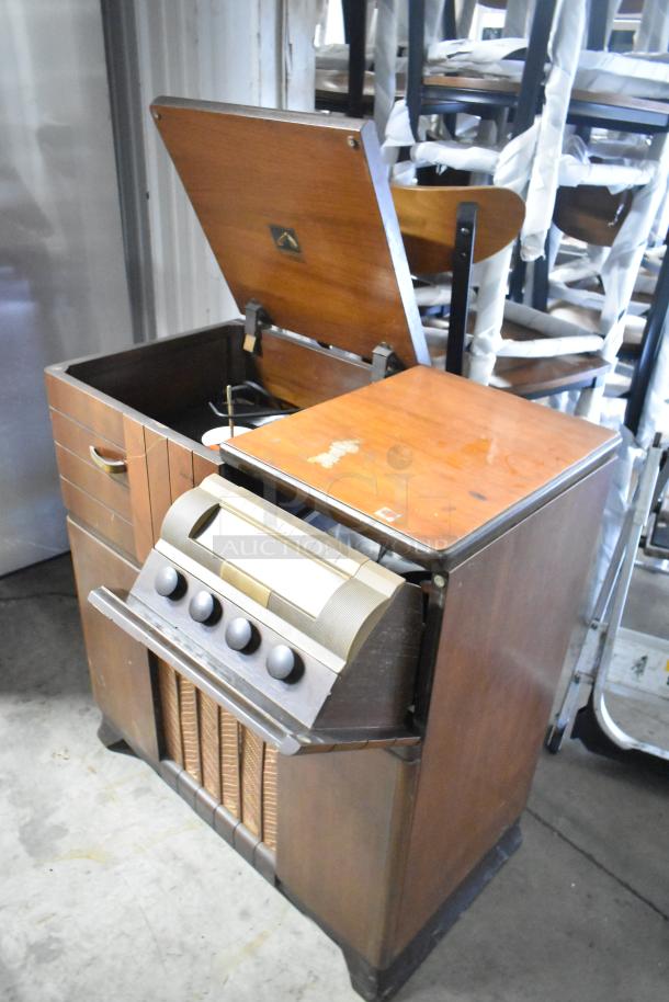 Victrola RCA Victor 67V1 wood pattern counter with record player, vintage style, showing wear on the surface.