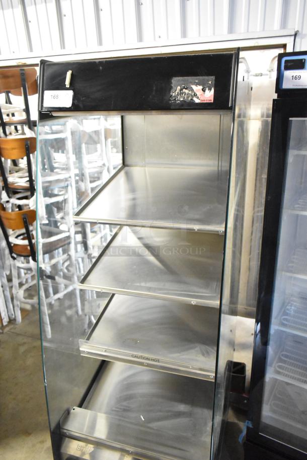 BKI HSS2-4T Metal Commercial Hot Merchandiser with multiple shelves on casters. 208V, 1 Phase, caution label visible.