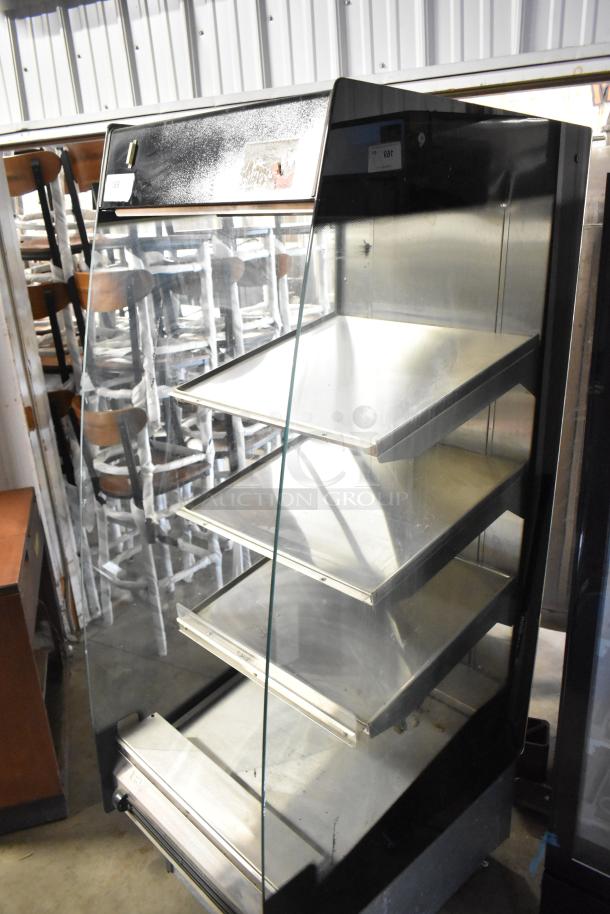 BKI HSS2-4T metal hot merchandiser, 4 shelves, on casters, 208V, 1-phase, used condition.