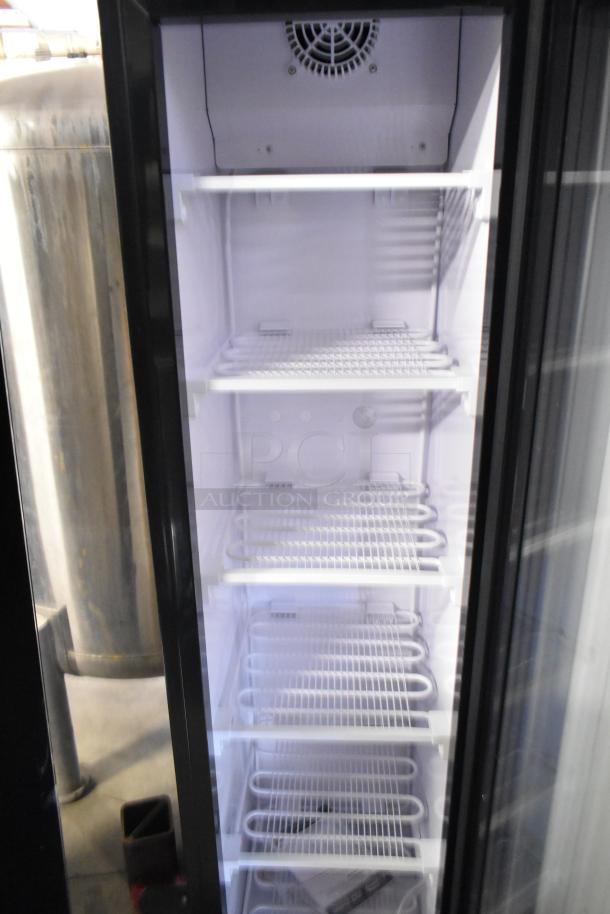 Brand new KoolMore KM-MDF-17S metal freezer merchandiser, single door, poly-coated racks, 115V, 1 phase, scratch and dent condition.