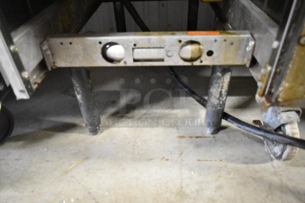 2018 Pitco Frialator SE14 electric deep fryer base, stainless steel, 208V, 3 phase, floor style with visible wear.