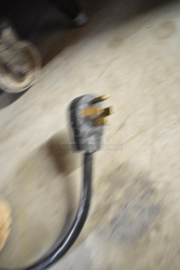 Plug of a 2018 Pitco Frialator SE14 electric fryer, 208V, 3-phase. Suitable for commercial kitchen use.