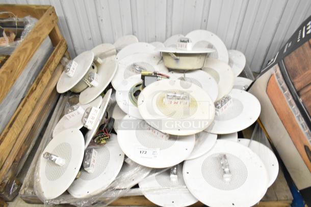 26 ceiling speakers with integrated fire alarm lights, white, fair condition. Visible fire labels on each unit.