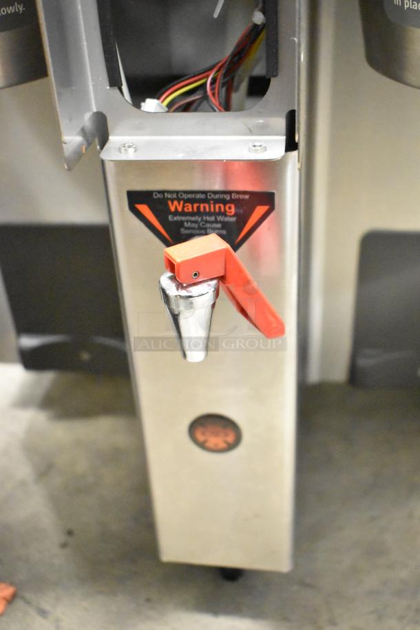 2016 Fetco CBS-2132-XTS stainless steel countertop double coffee machine, hot water dispenser, warning label visible.