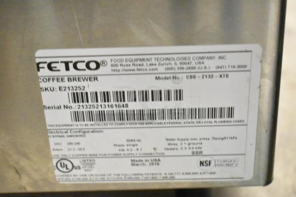 2016 Fetco CBS-2132-XTS stainless steel commercial coffee machine label showing model, SKU, serial number, and specs.