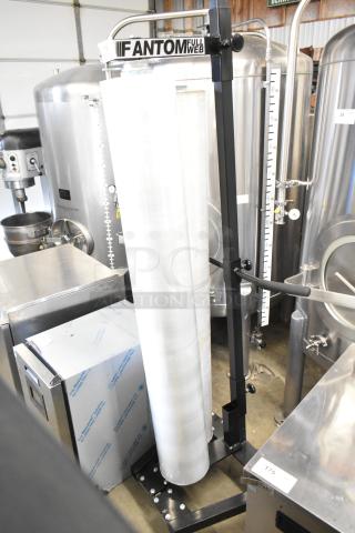 Fantom Full Web Manual Stretch Wrapper, in excellent condition. Black frame, includes roll holder, visible brand logo on top.