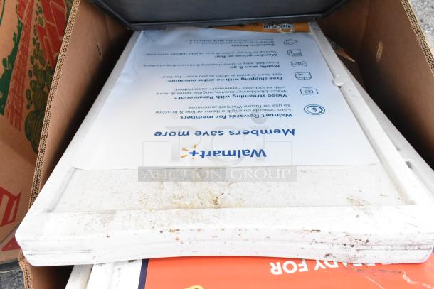 Six white A-frame sidewalk signs with visible wear, featuring a Walmart advertisement. Auction includes 6 signs per bid.