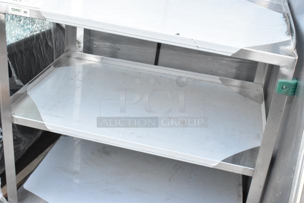 Brand new Regency 600CT1931WD utility cart, 18 3/4" x 30 1/2", three shelves, 18 gauge 430 stainless steel, scratch and dent.