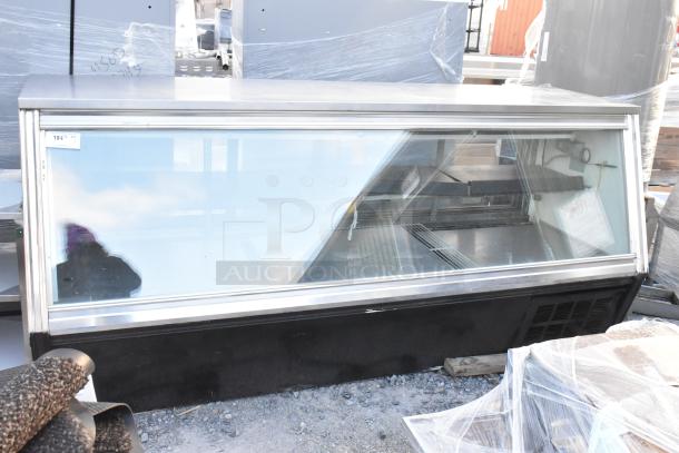 Leader metal deli display case merchandiser, commercial floor style, glass front. Good condition with minor wear.