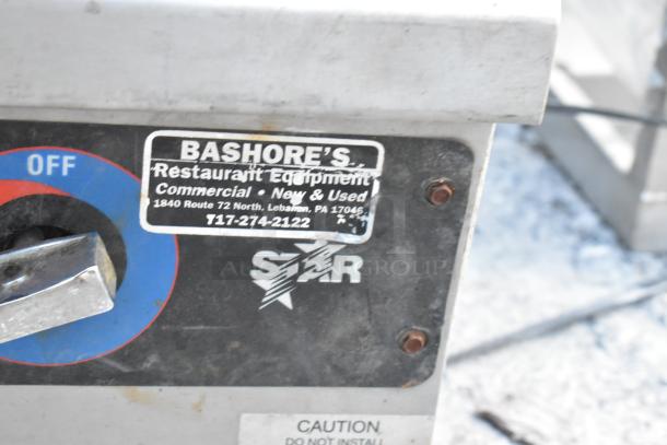 Star Stainless Steel Gas Flat Top Griddle, commercial-grade. Label: Bashore's Restaurant Equipment, Lebanon, PA.