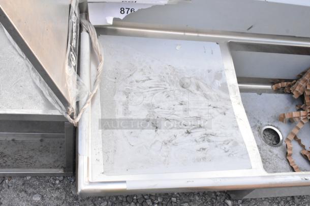 BRAND NEW SCRATCH AND DENT Regency 600S32323224 stainless steel 3-bay sink with dual drain boards, no legs.