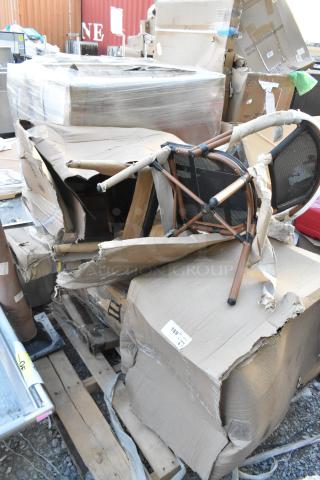 Damaged boxes containing brand new Lancaster Table & Seating Bistro Black Chair and Choice Gray Utility Cart with tags visible.