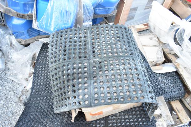 12 brand new Lavex 844LRGTMA3636 interlocking rubber mats, 3' x 3', 5/8" thick, in original packaging, visible labeling.