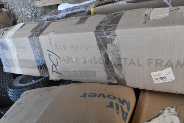7 new scratch and dent items including hand truck, work table, air mover. Box label: "Bar Height Table Base, Metal Frame, 30"x9.6". Tag: "618-1099FL".