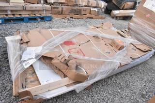 Stainless Steel Table, brand new, shows noticeable packaging damage. Visible tags with shipping info. Auction-ready condition.