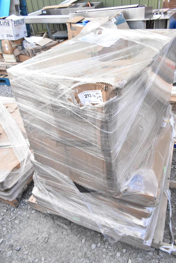 9 new scratch and dent Lancaster Table & Seating 30" round MDF table tops with black wood finish, wrapped on pallet.