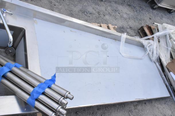 Brand new Regency 600ST3096L table with sink, 30x96 inches, 304 stainless steel, scratch and dent condition.