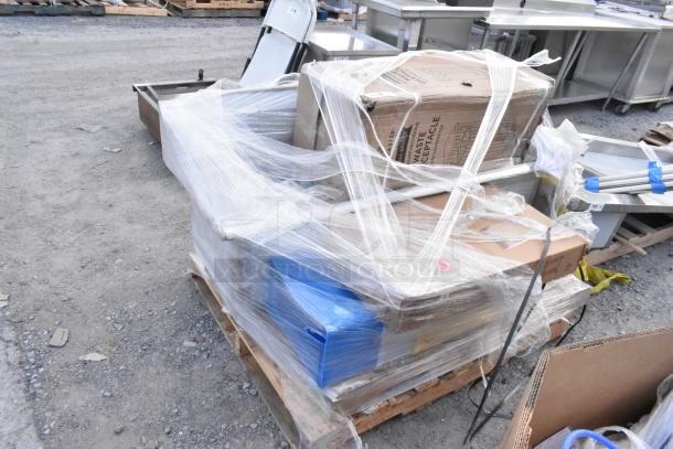 Four new scratch and dent items on a pallet, including ingredient bins. Wrapped in plastic, some visible boxes labeled "Waste Receptacle."