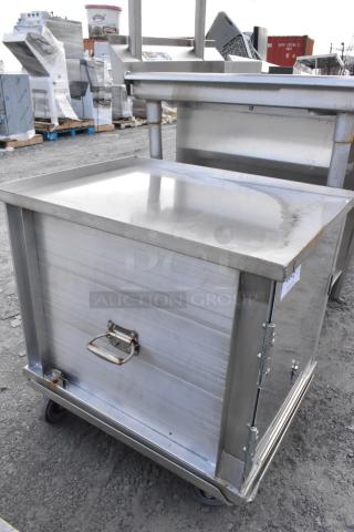 Piper Products 912 metal food carrying case on commercial casters. Features sturdy handle and hinged front. Good condition.