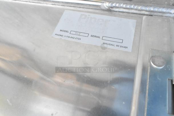 Piper Products 912 metal food carrying case with commercial casters, labeled, model 912, contact details visible.