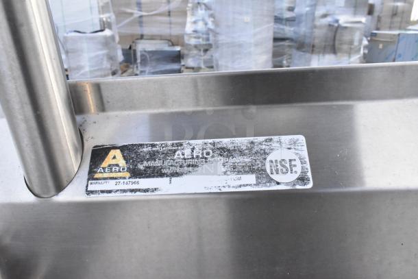 Stainless steel commercial dishwasher table with over and under shelves, Aero brand, NSF certified, model 27-147966.