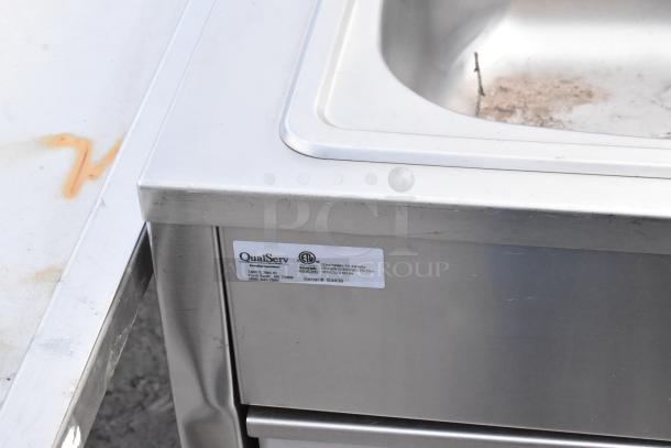 QualServ stainless steel commercial portable sink with casters. Features ETL certification, serial number 63439. Used condition.