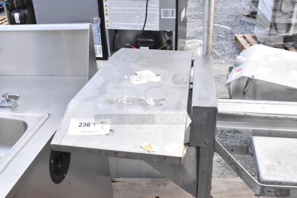 Hobart HWS-4 stainless steel floor wrapping station, 120V, 1 phase. Used condition with label residue.
