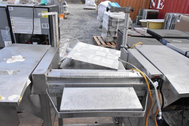 Hobart HWS-4 stainless steel commercial wrapping station; floor style; 120V, 1 phase; used condition with visible wear.
