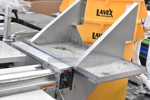 Hobart HWS-4 stainless steel commercial wrapping station, floor style, 120 volts, 1 phase, shown in used condition.