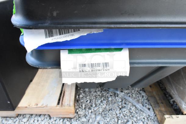 Four brand new scratch and dent poly tilt trucks on pallet. Tags showing barcodes: 475AGU002TBL, 475AGU001TGY.