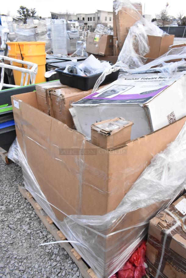 Bulk auction of 9 scratch and dent items, including Katchall Flatware Retriever and Speed Rail, in cardboard boxes.