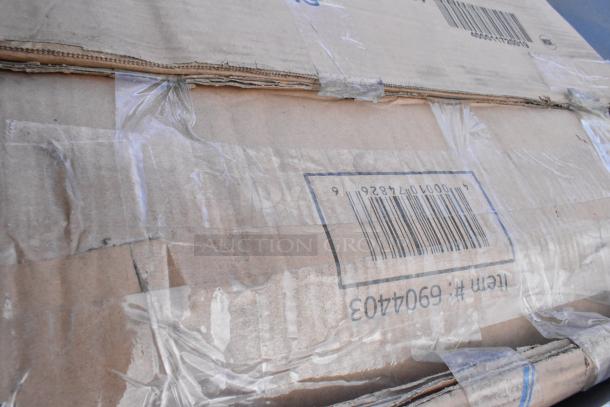 Cardboard packaging of brand-new scratch and dent items, barcode visible, possible contents include Katchall Flatware Retriever.