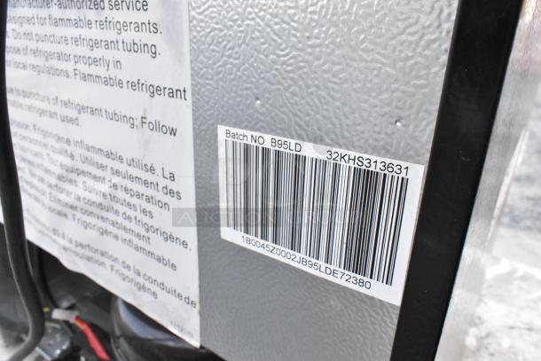 Black & Decker BCFA27B mini cooler, 115 volts, 1 phase. Visible label: Batch NO. B95LD, barcode.