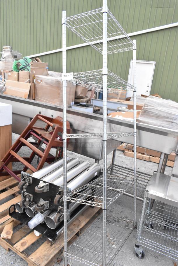 Chrome finish 5-tier wire shelving unit, in good condition. Note: buyer must dismantle for shipping.