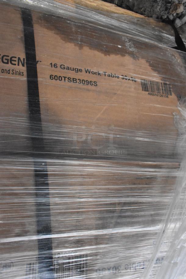 Pallet with boxed Regency 600TSB3096S 30" x 96" 16-Gauge stainless steel work table; scratch and dent condition.