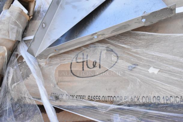 Packaging of Regency stainless steel work table parts, tagged "Hel". Includes scratch and dent items, wrapped in plastic.