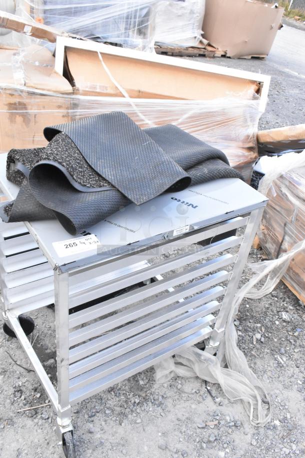 Regency metal commercial pan transport rack with floor mat on top, brand new with minor scratches and dents, tags visible.