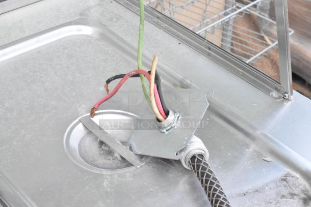 Stainless steel 4-bay electric steam table, featuring a sneeze guard and tray slide. Wiring and insert detail shown.