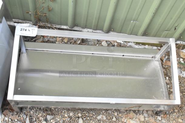 Brand new metal unit with minor scratches and dents, rectangular frame, durable construction, and auction tag indicating lot 274.