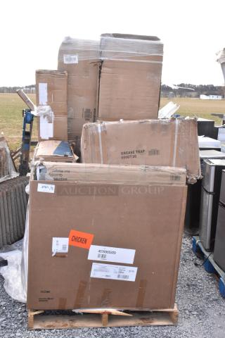 Pallet with 7 boxed items including Regency grease trap and Lavex janitor cart. Boxes show minor wear, labels visible.